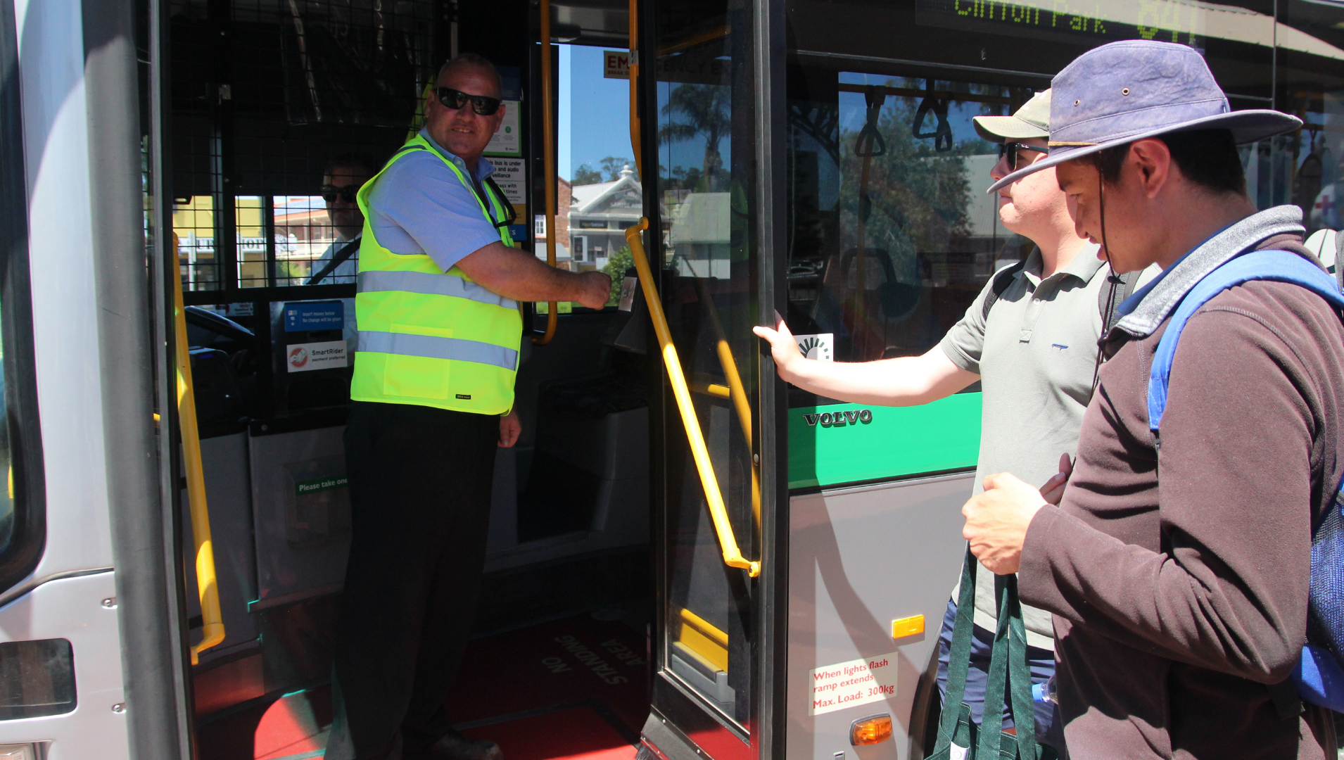 Transperth bus drive speaking to a small crowd of people at the public transport event